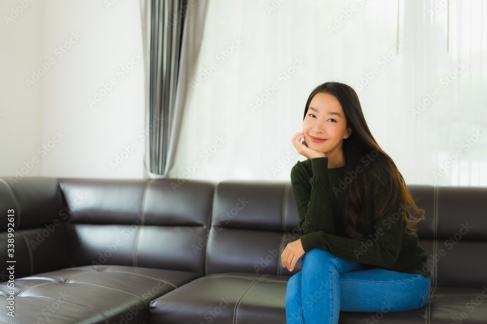 Beautiful portrait young asian woman sit relax on sofa Beautiful portrait young asian woman sit relax on sofa