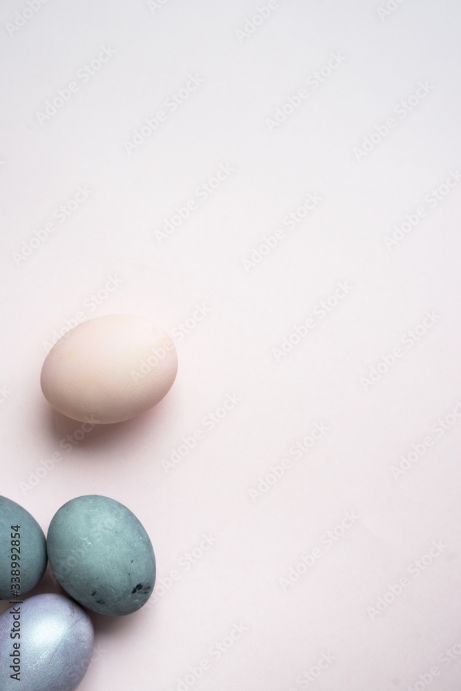 painted Egg shaped and space for text on pink background, flat lay. Easter celebration concept painted Egg shaped and space for text on pink background, flat lay. Easter celebration concept