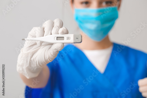 Doctor with medical mask an...