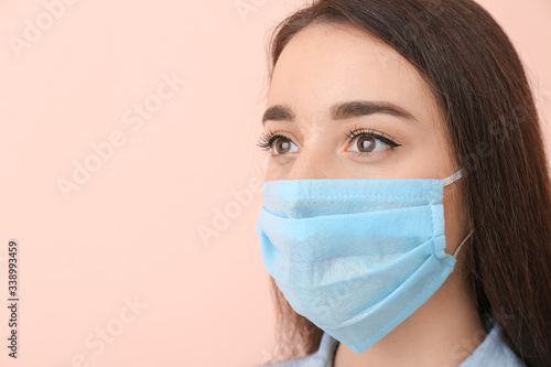 Young woman wearing medical...