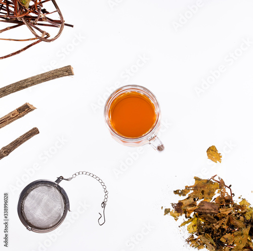Valeriana officinalis - Valerian twigs and tea. White background