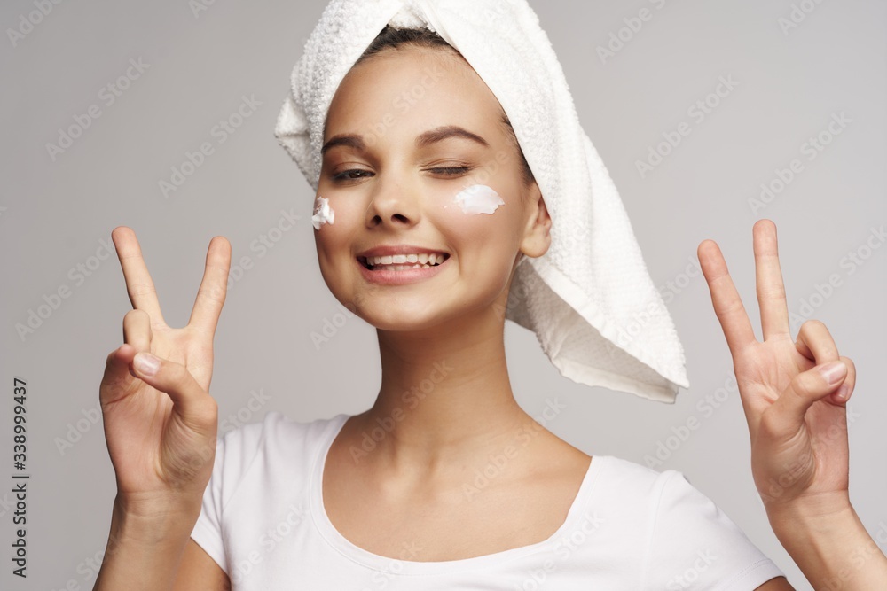 young woman with towel on head young woman with towel on head