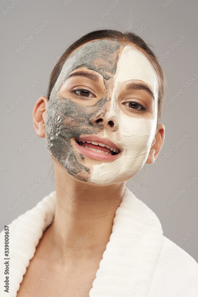 Beautiful woman with facial mask moisturizing and rejuvenating spa treatments Beautiful woman with facial mask moisturizing and rejuvenating spa treatments