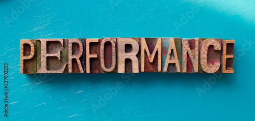 Performance word written with wood type blocks