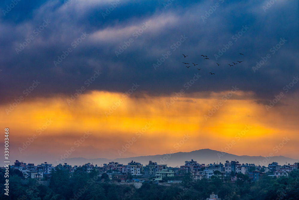 Morning Sun Shining through the Storm Clouds over Kathmandu