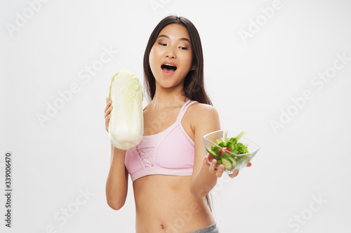 Beautiful woman with salad in a plate a diet © SHOTPRIME STUDIO