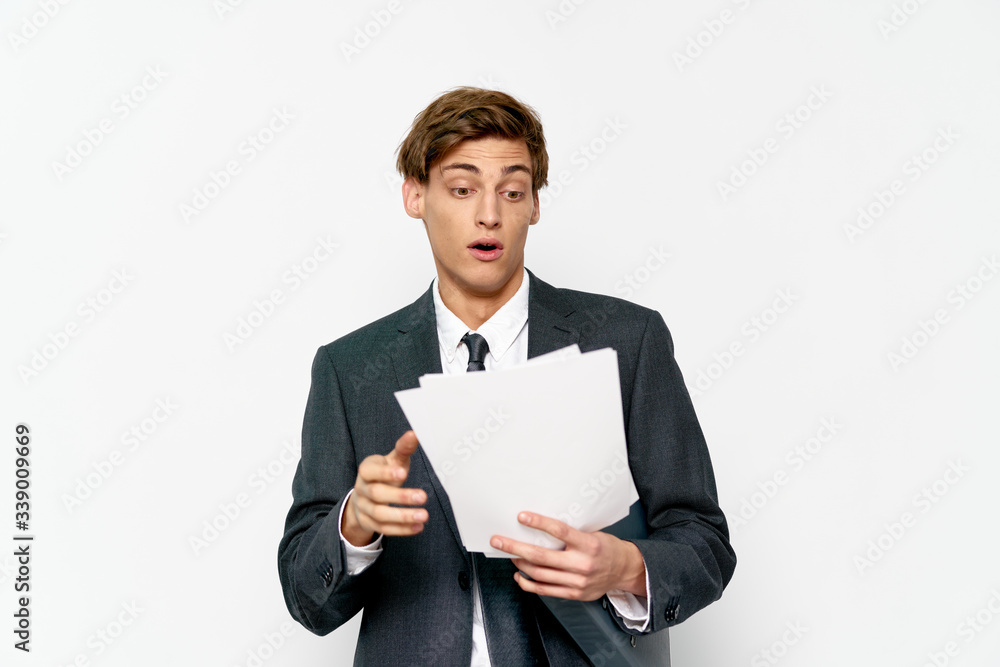 businessman holding a blank business card businessman holding a blank business card