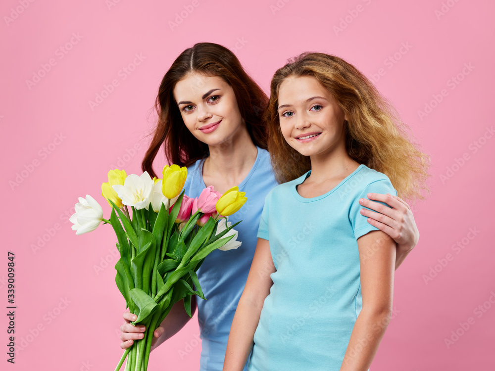 mother and daughter with tulips mother and daughter with tulips