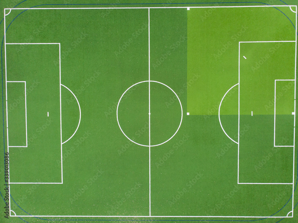 Fototapeta premium green field for football,soccer, top view, texture, screensaver for design. Advertising, sports betting, sports screensaver