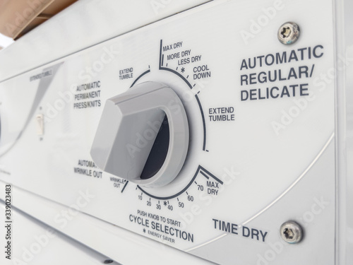 knob on a clothing dryer control panel