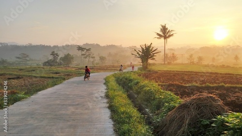 man and woman walking in the countryside