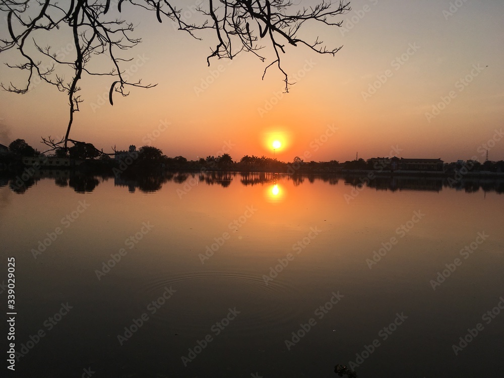 Naklejka premium sunset on the river