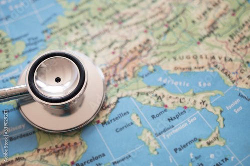 Stethoscope on Italy map background