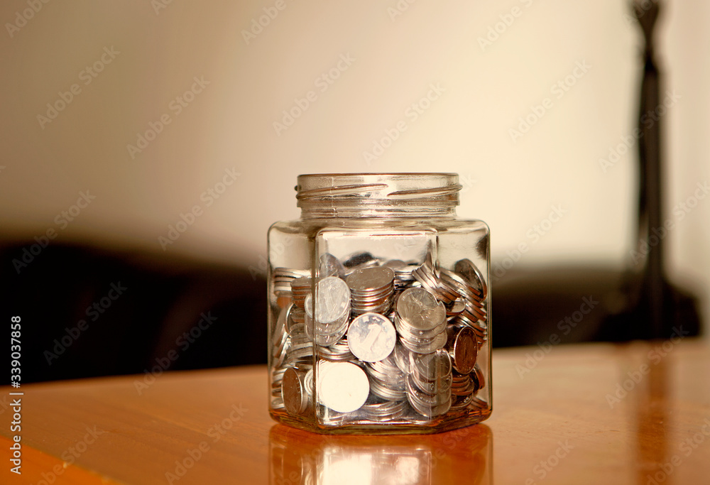Money in glass jar Money in glass jar