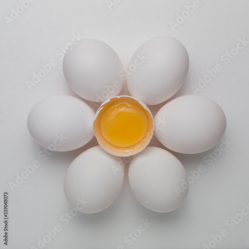 
egg on white background with egg is broken