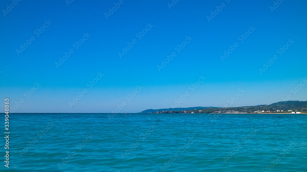 Blue water of Tyrrhenian sea in Vada, Tuscany, Italy.