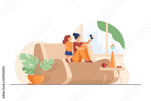 Mom and daughter using smartphone for video chat at home. Woman and little girl sitting on couch and taking selfie with phone. Vector illustration for family, having fun together concept