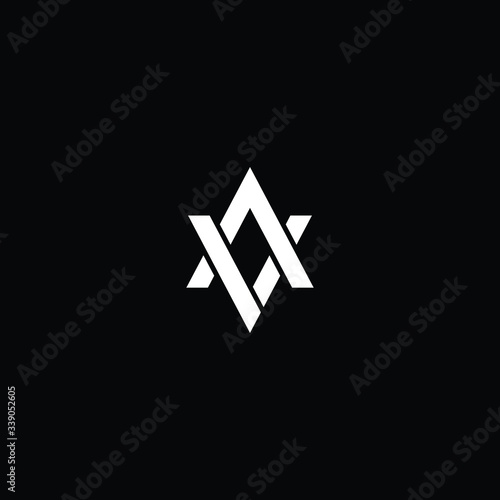 Minimal elegant monogram art logo. Outstanding professional trendy awesome artistic AV VA initial based Alphabet icon logo. Premium Business logo White color on black background
