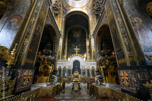 Interior of the St. Volodymyr's Cathedral with altar and fragments of frescoes wall paintings. Kyiv, Ukraine. April 2020