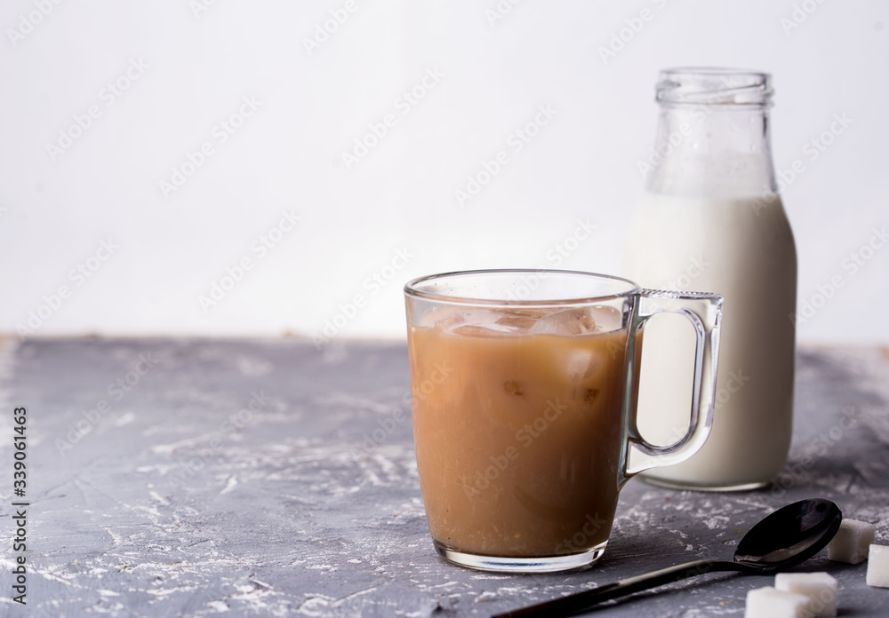Fragrant custard with milk, spoon, sugar, concrete background. Fragrant custard with milk, spoon, sugar, concrete background.