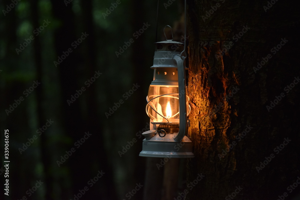 kerosene lamp at night - obrazy, fototapety, plakaty 