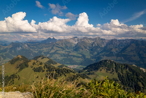 Panoramic wide-angle view of a beautiful alpine mountain landscape in the region of Chur, Switzerland.