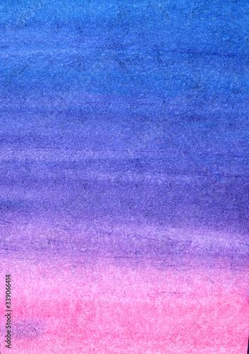 Beautiful watercolor background in pastel tones. Colorful hand drawn illustration graduating from delicate blue to gentle pink color. Extract of sunset sky on textured paper © Olga