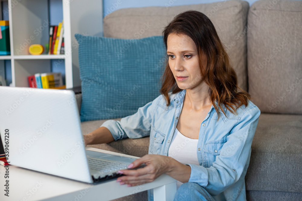 Beautiful young woman working from home. Work in home office. Stay at home concept. Beautiful young woman working from home. Work in home office. Stay at home concept.