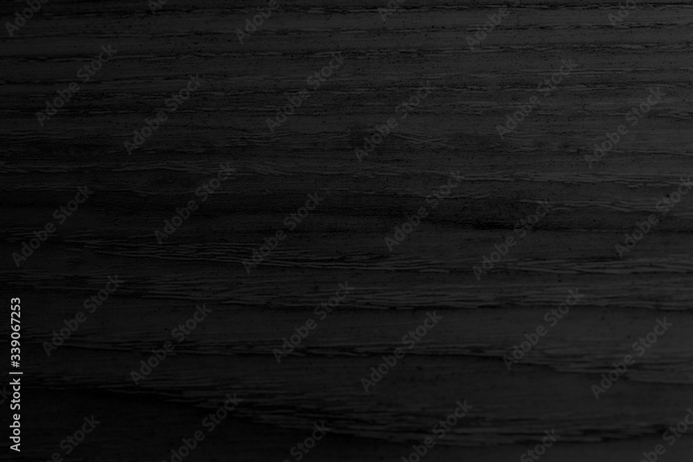 Naklejka premium Black wooden plank background
