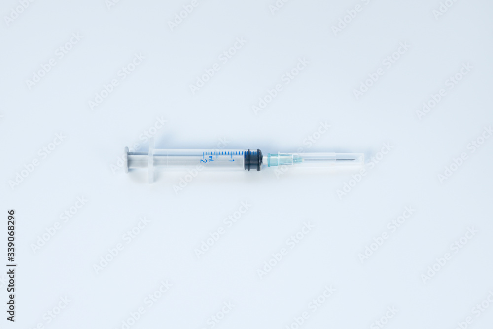 Close up of sterile syringe on the table Close up of sterile syringe on the table