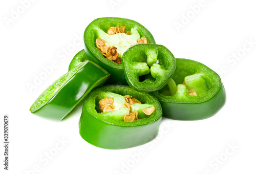sliced jalapeno peppers isolated on white background. Green chili pepper. Capsicum annuum