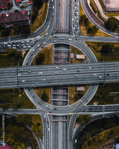 Aerial perspective view of busiest roundabout somewhere in Malaysia. This roundabout received thousand of vehicles everyday. photo