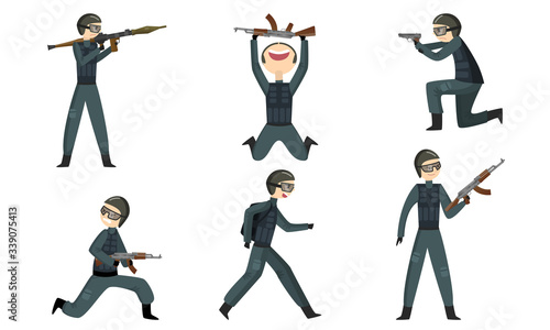 Law enforcement officers in dark traditional military protective uniform with gun