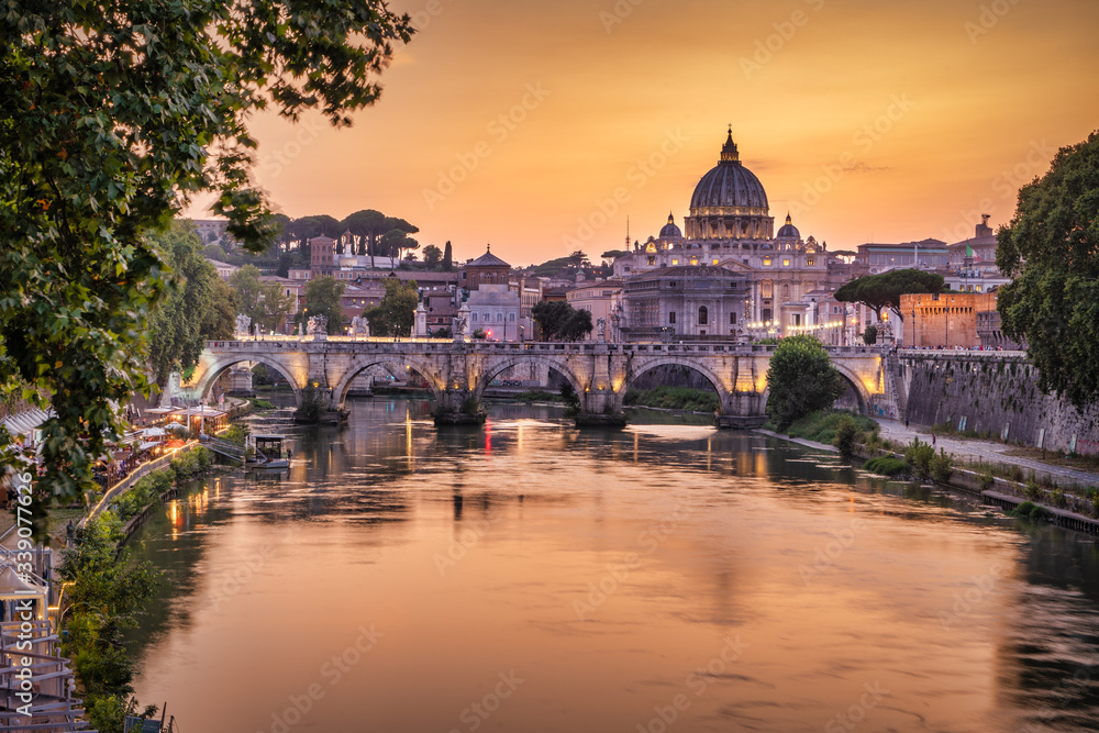 View of the Tiber bridge St. Angelo and St. Peter's Cathedral