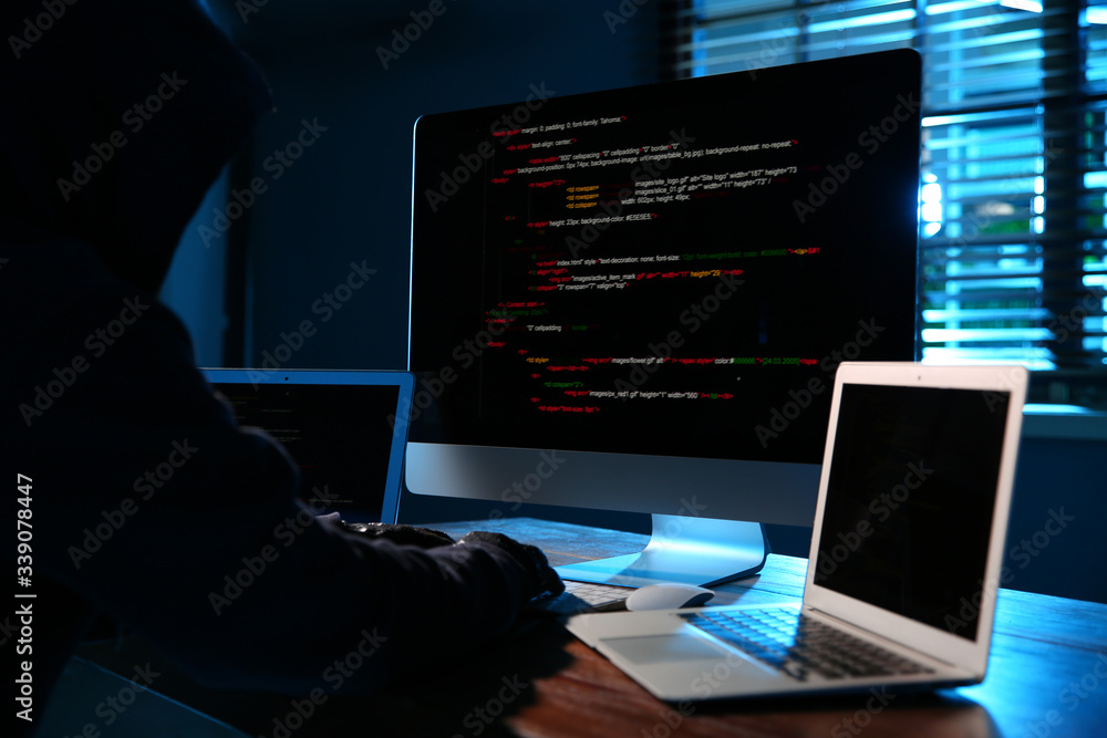 Hacker with computers in dark room. Cyber crime Hacker with computers in dark room. Cyber crime