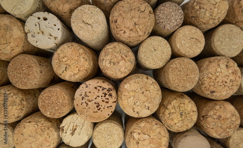 Many wine corks of different design, top down shot from above.