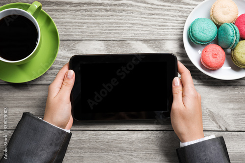 Businesswoman having coffee break photo