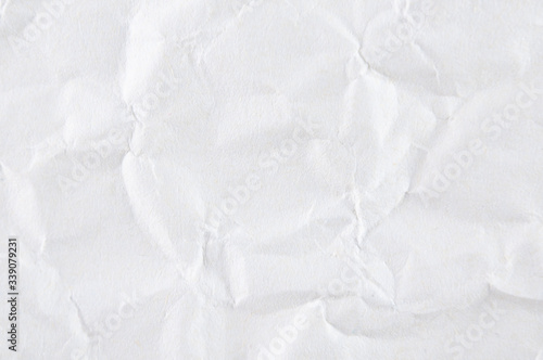 white crumpled paper texture background with blank space for design