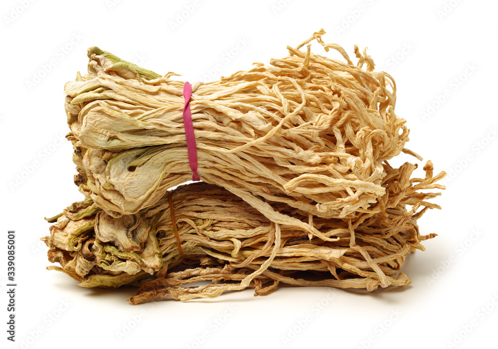 Dried shredded daikon radish on white background . Dieting, china. Dried shredded daikon radish on white background . Dieting, china.