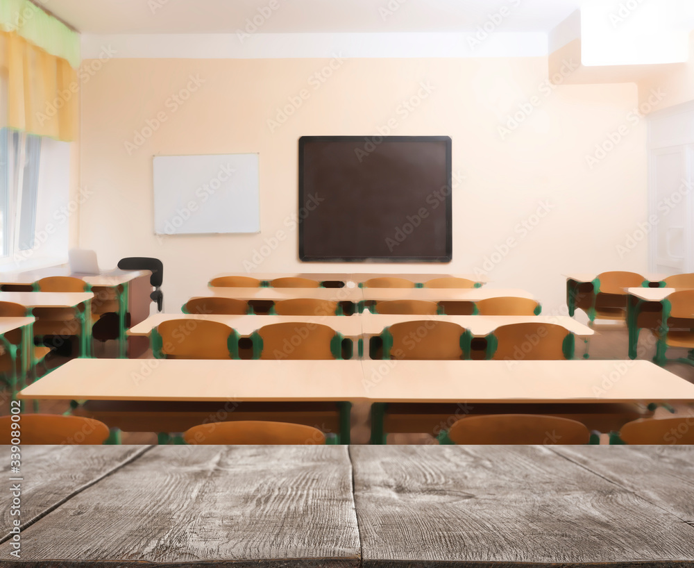 View from wooden table in empty classroom