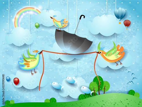 Fantasy landscape and two birds hold a rope with an umbrella in balance