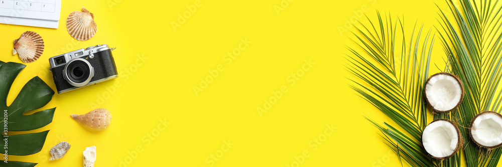 Flat lay composition with vacation accessories on yellow background, space for text. Banner design Flat lay composition with vacation accessories on yellow background, space for text. Banner design