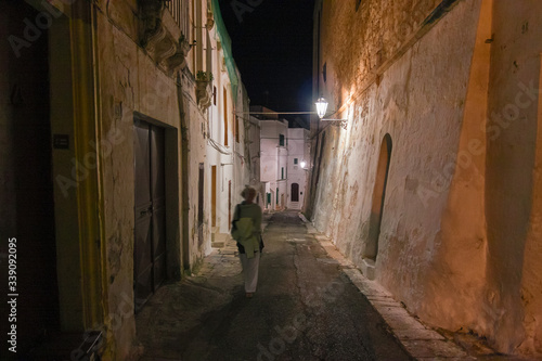 Night view of the streets of the historic center of the white city of Ostuni in Puglia, Italy. © serghi8
