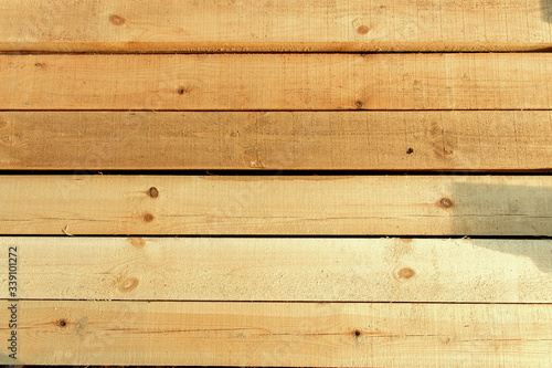 Wooden timber wall. Old wood texture. Brown and yellow natural simple wooden texture material background.