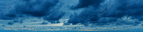 Dramatic sky with stormy clouds. Thunderstorm clouds sky background., banner