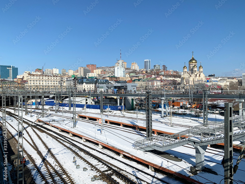 Vladivostok, Russia, March, 05,2020.Railway platforms and a view of the city of Vladivostok in early spring