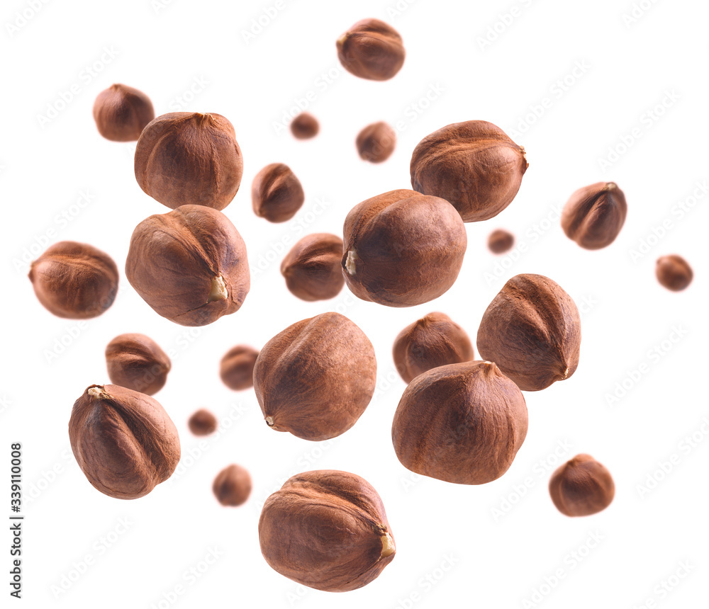 Peeled hazelnut levitates on a white background Peeled hazelnut levitates on a white background