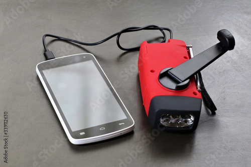 When you're in an emergency situation and don't have an outlet to charge your cell phone, this hand crank phone charger can be a life saver.