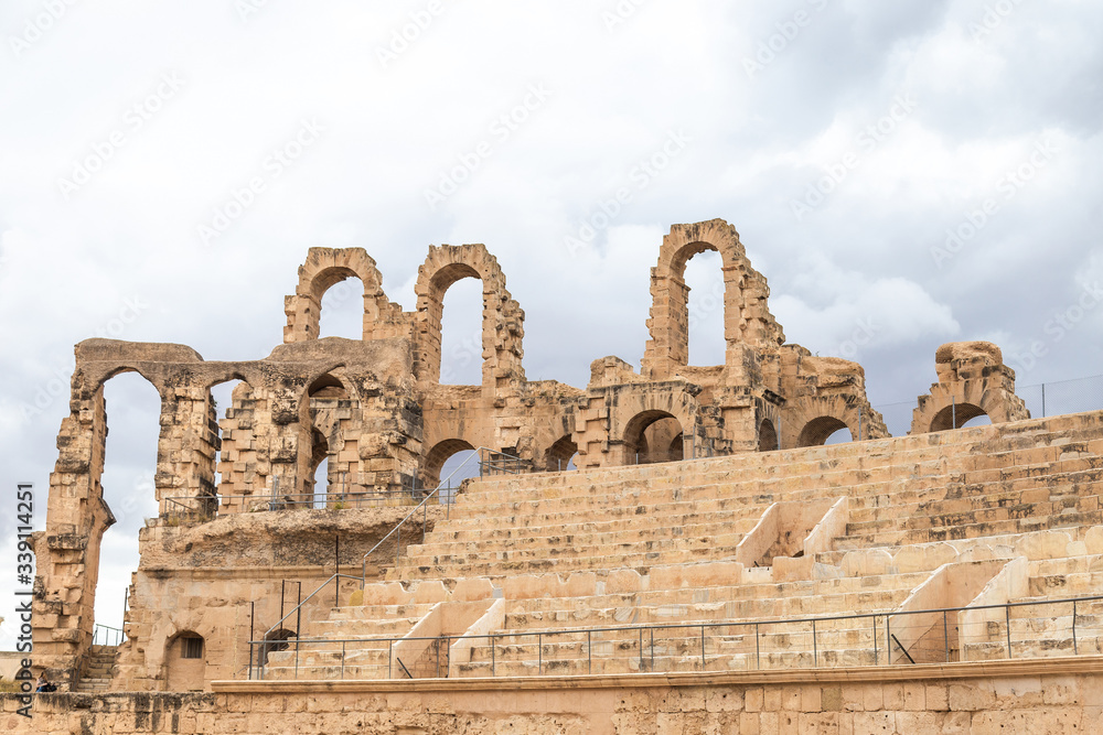 Horizontal color photography of old antique amazing well conserved huge Amphitheatre of El Jem in Tunisia.