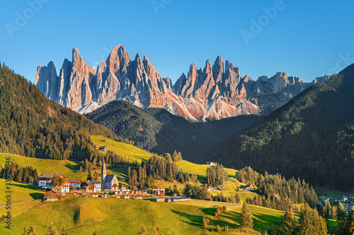 Famous alpine place  Santa Maddalena village with magical Dolomites mountains in background, Val di Funes valley, Trentino Alto Adige region, Italy © Rastislav Sedlak SK